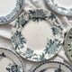 6 mismatched Saint Amand ironware dessert plates