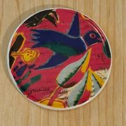 Coasters by the artist Guillaume Cornelis, known as Corneille, from 2001.