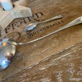 1 ladle and 1 spoon in silver