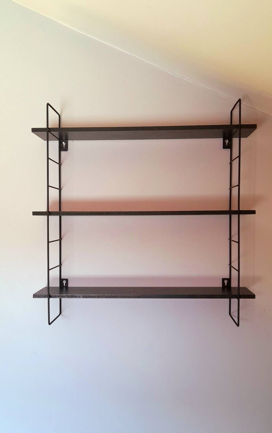 String style wall shelf