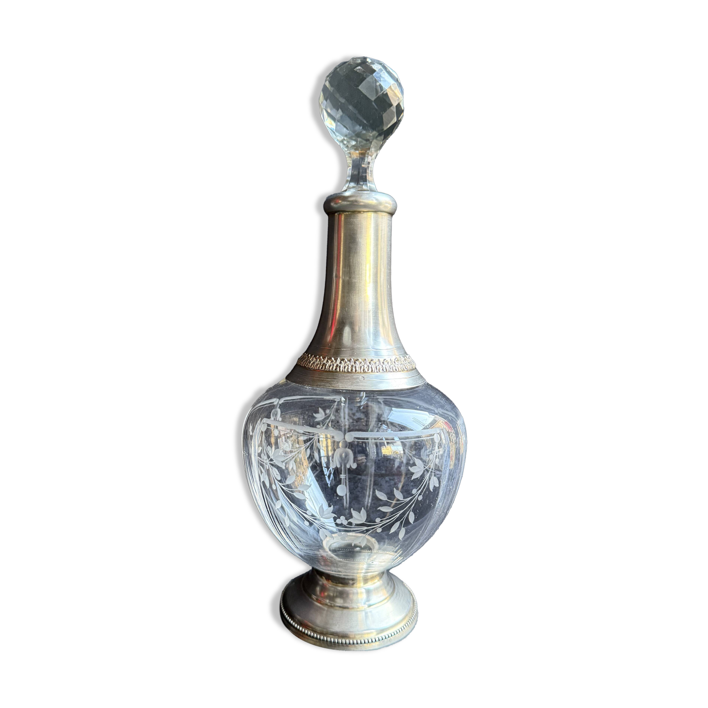 Cut crystal carafe with silver frame