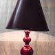 Turned wood table lamp in plum color - 1970s