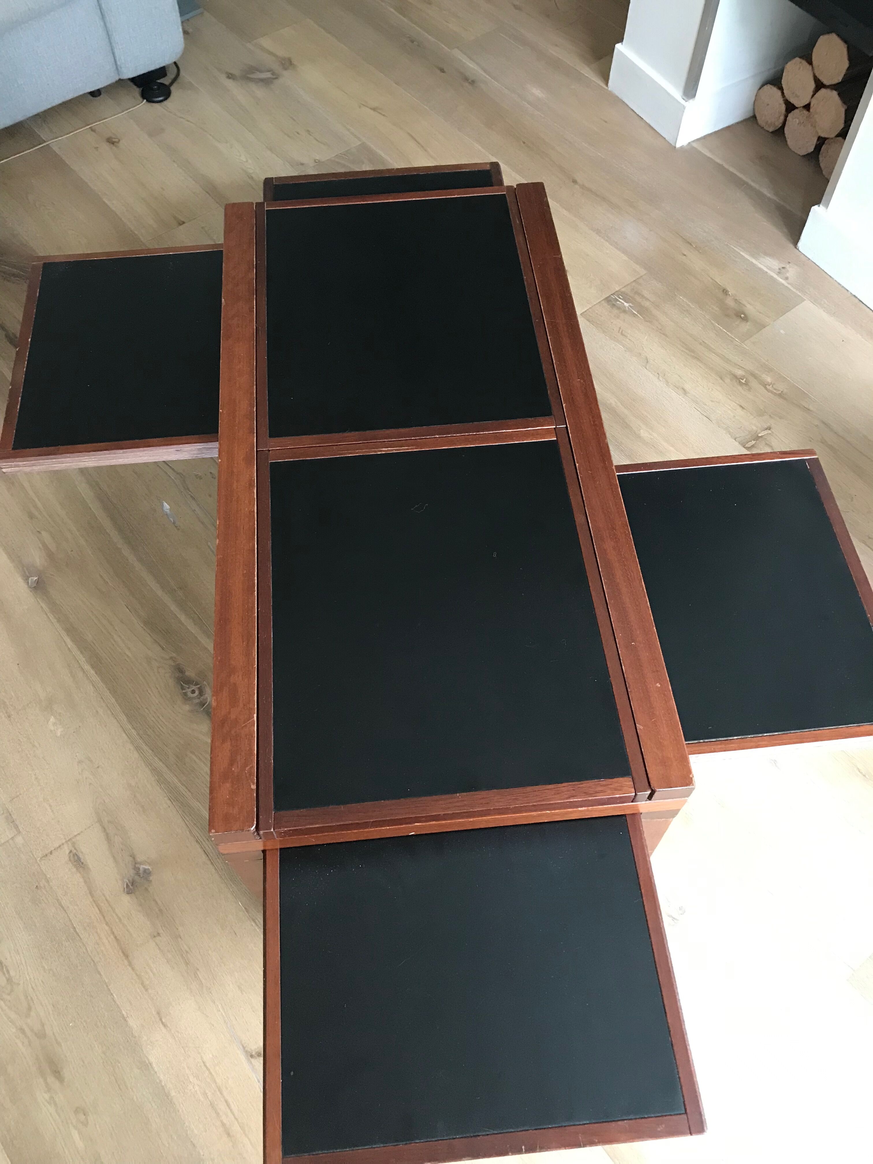 Coffee table with sliding tops