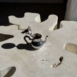 Silver-plated teapot with black handle