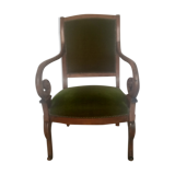 Green velvet armchair
