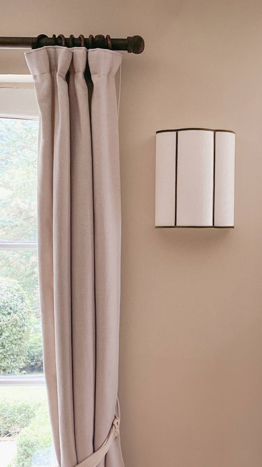 Pair of cream jute wall sconces and bronze velvet