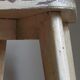 Old workshop stool in patinated solid wood