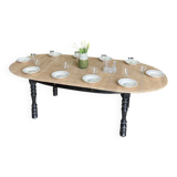 Oval table with integrated extension