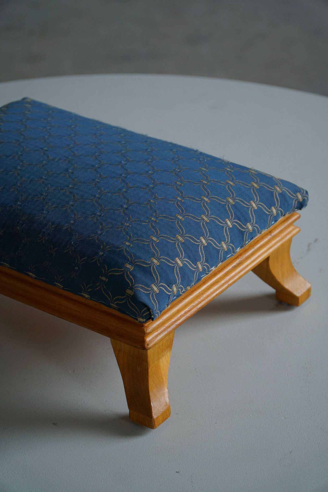 French Art Deco low stool with vintage upholstery made in the 1940s.