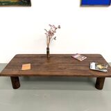 Modernist coffee table in solid elm, cylindrical pine base, 1970s.