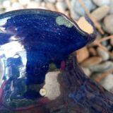 Vintage ceramic pitcher with geometric patterns