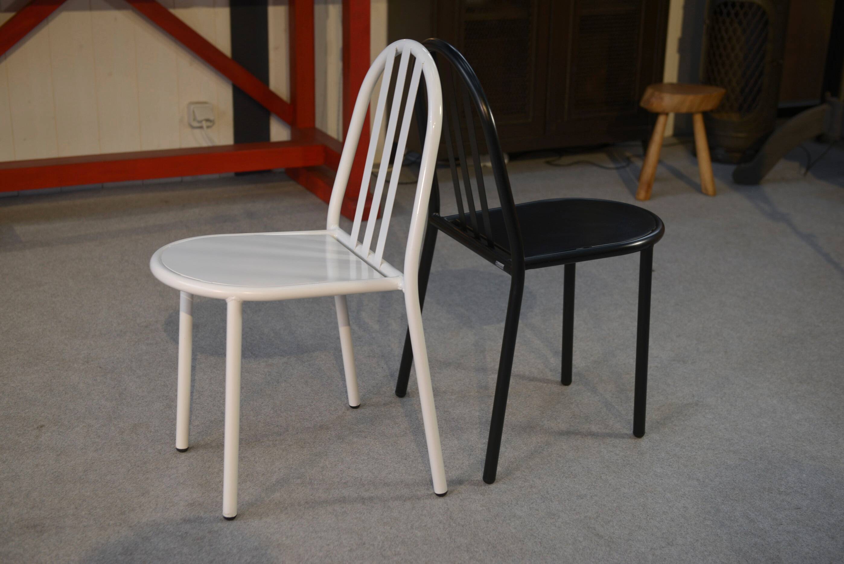 Pair of white and black chairs by Mallet Stevens