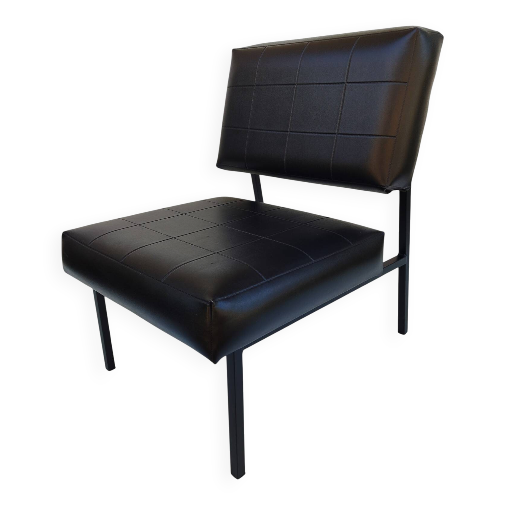 Modernist armchair in black faux leather and metal – 1960s