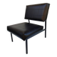 Modernist armchair in black faux leather and metal – 1960s
