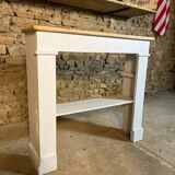 White and wood fireplace