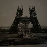 Two photos of the Eiffel Tower under construction