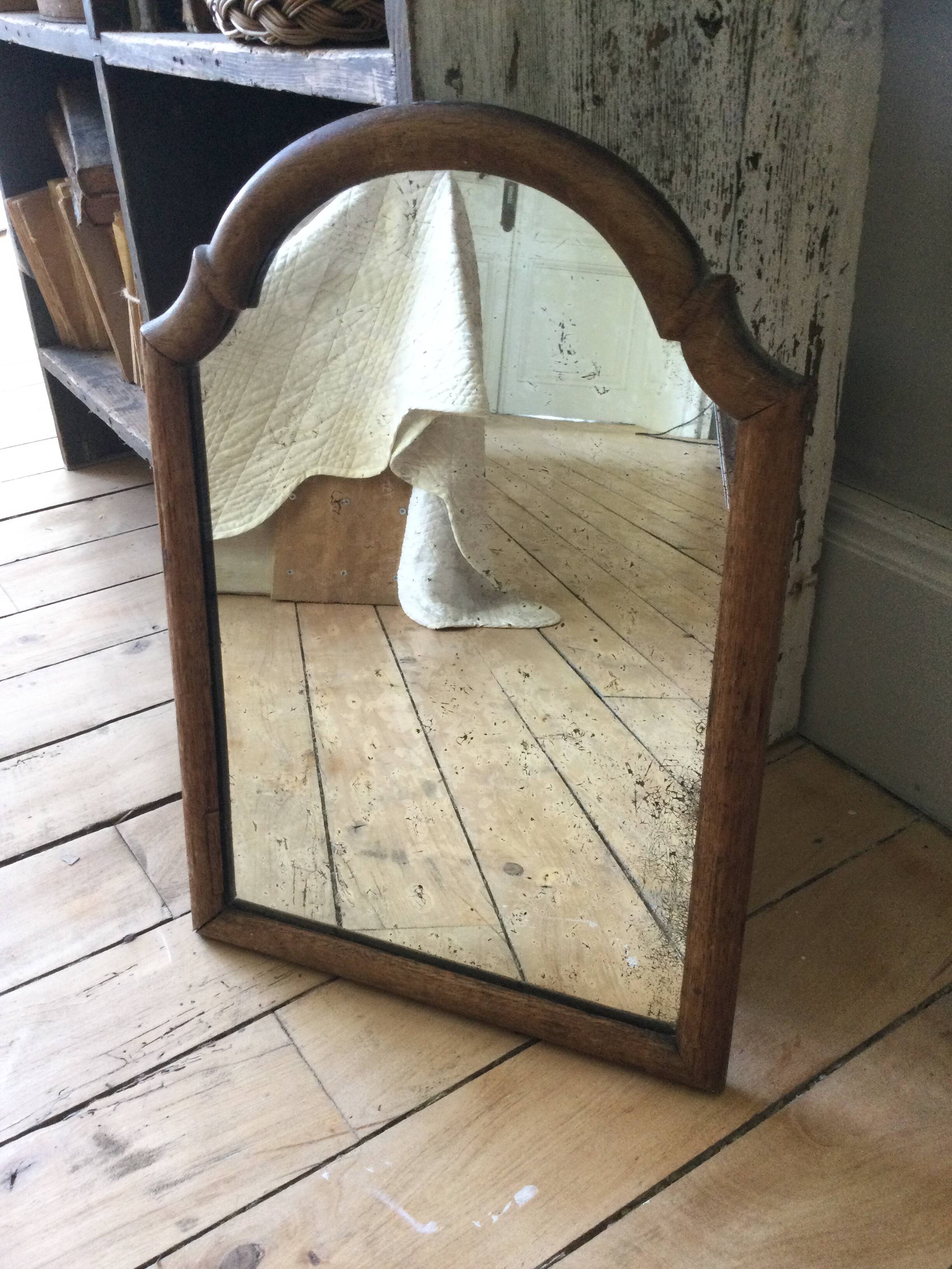Antique tall round mirror
