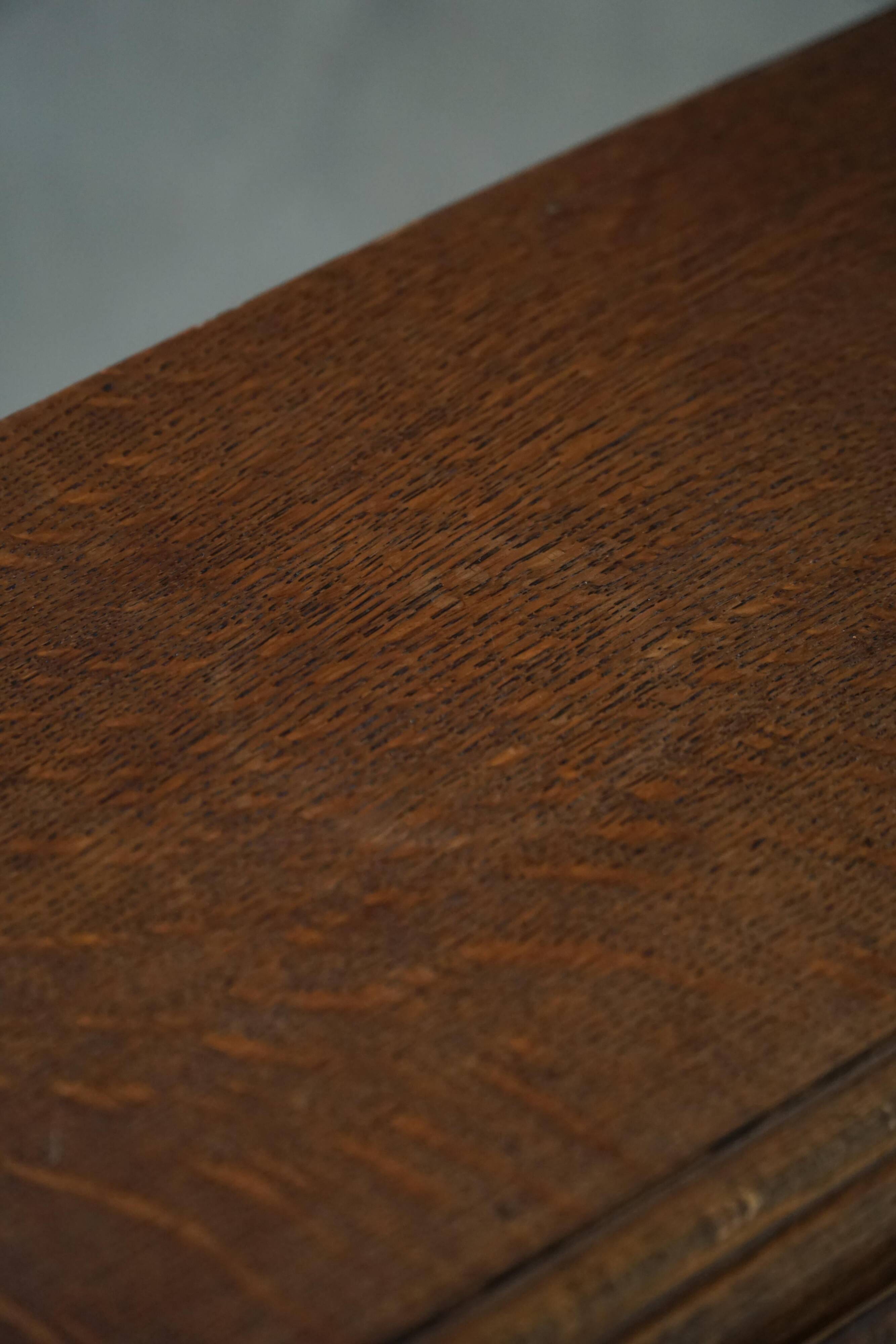 Desk / Chest of drawers in modern Danish oak from the early 20th century with shell handles.