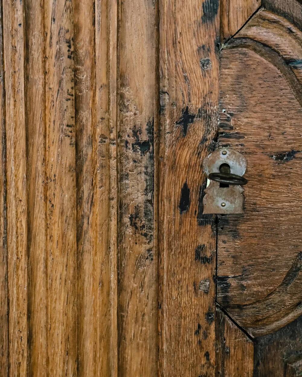 Antique French rustic wardrobe with star inlays.