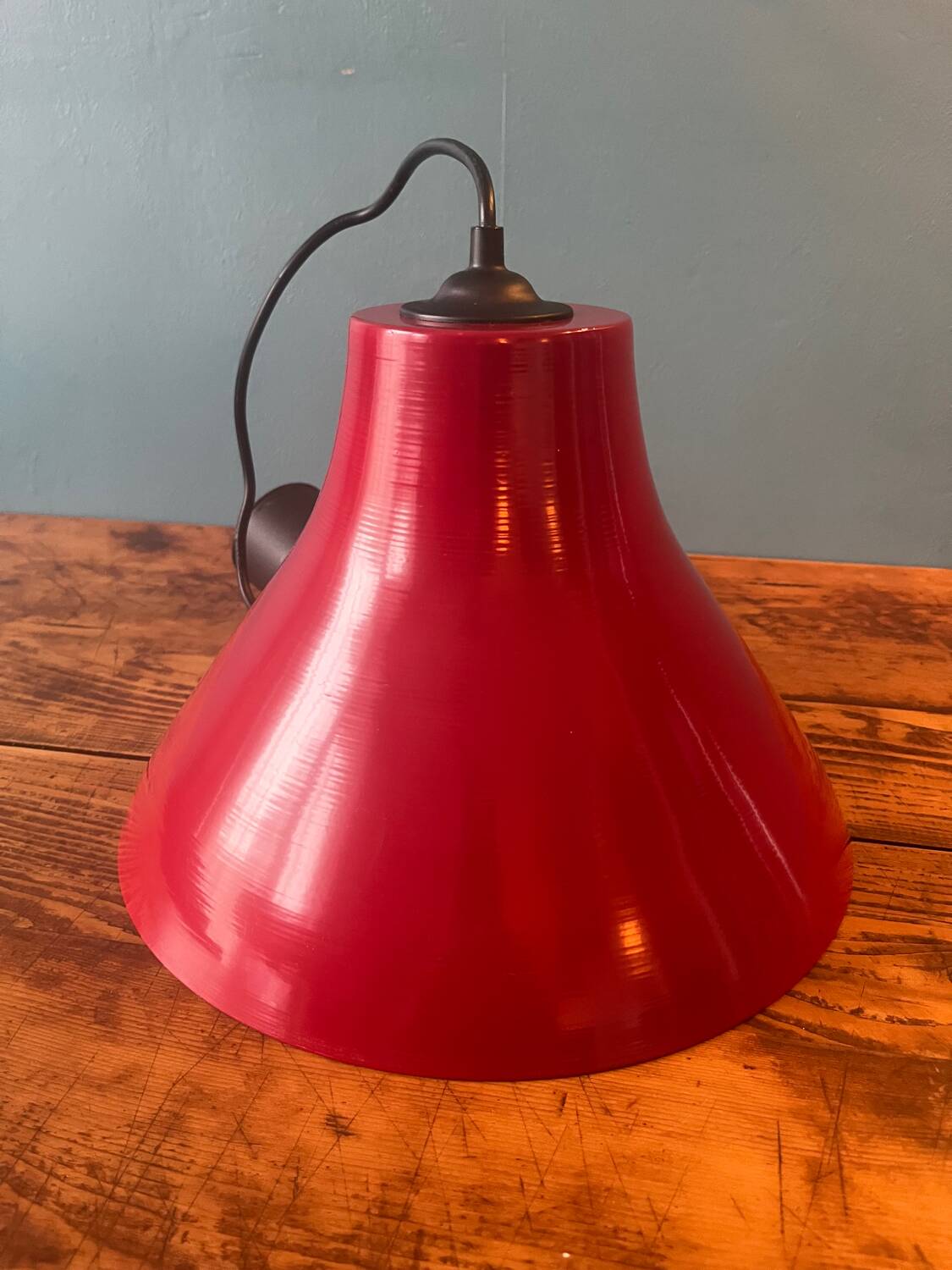 Red metal bell pendant from the 80s