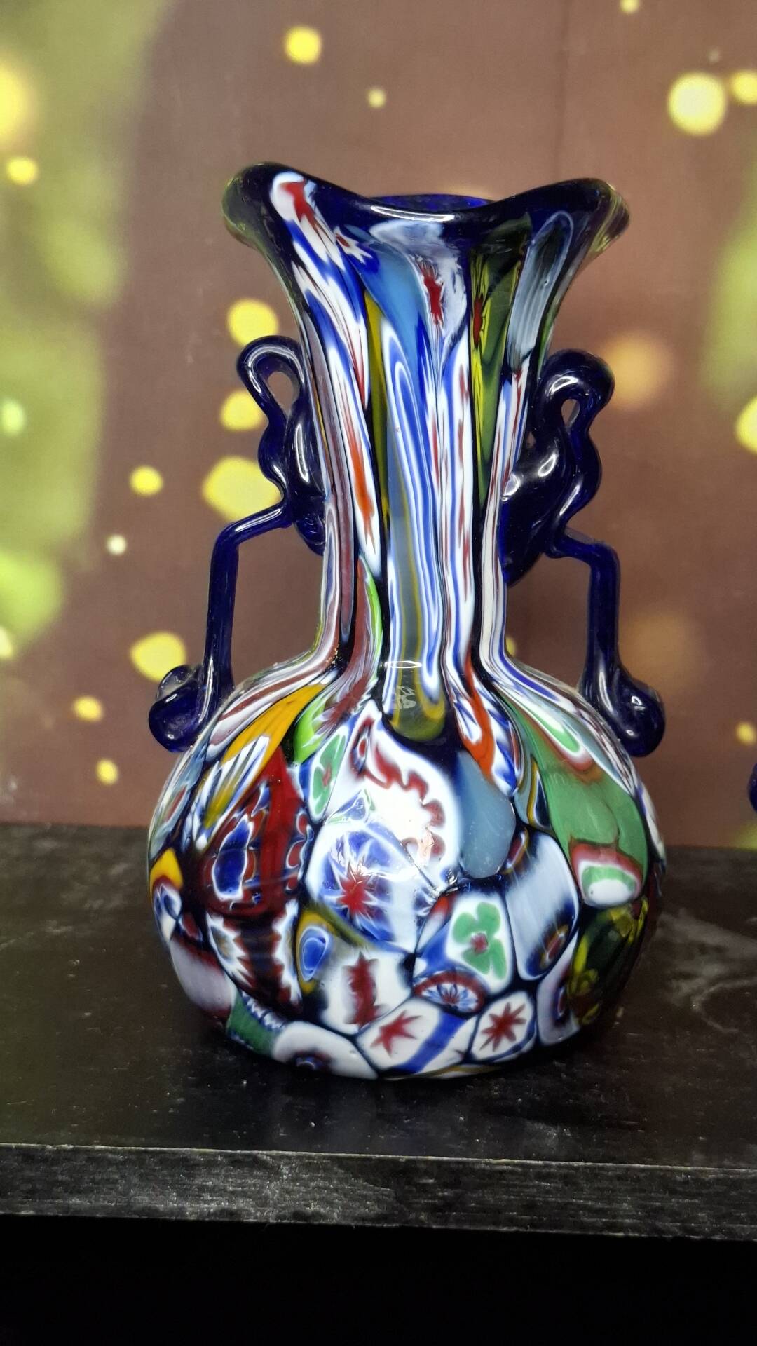 Pair of antique millefiori glass vases attributed to Murano with 2 handles.