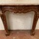 Fireplace three shells louis XV style in royal red marble XIX century
