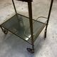 Vintage 70s serving trolley in gold metal and smoked glass