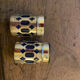 Vintage pepper shaker duo