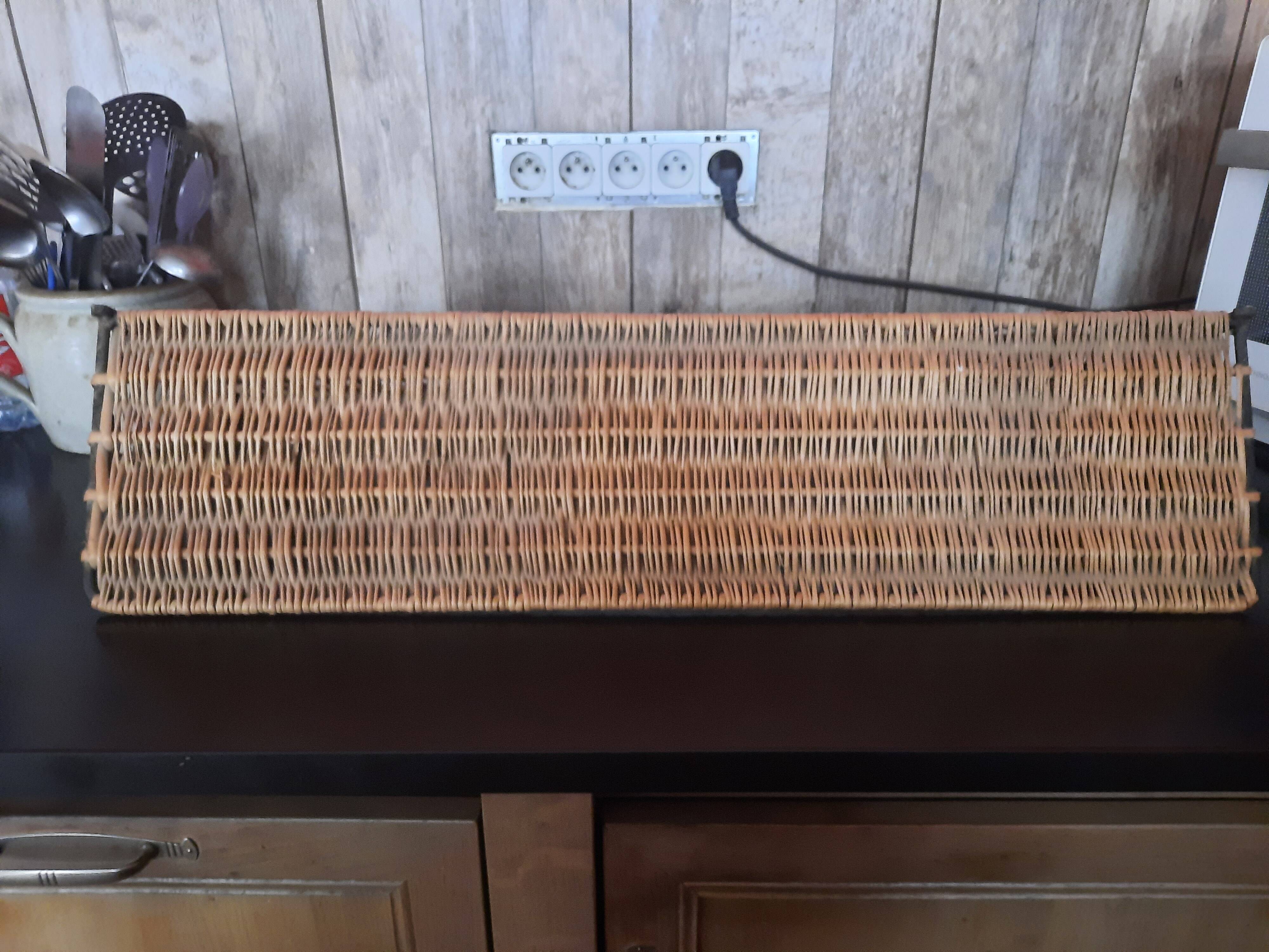 Wicker wall coat holder