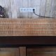 Wicker wall coat holder