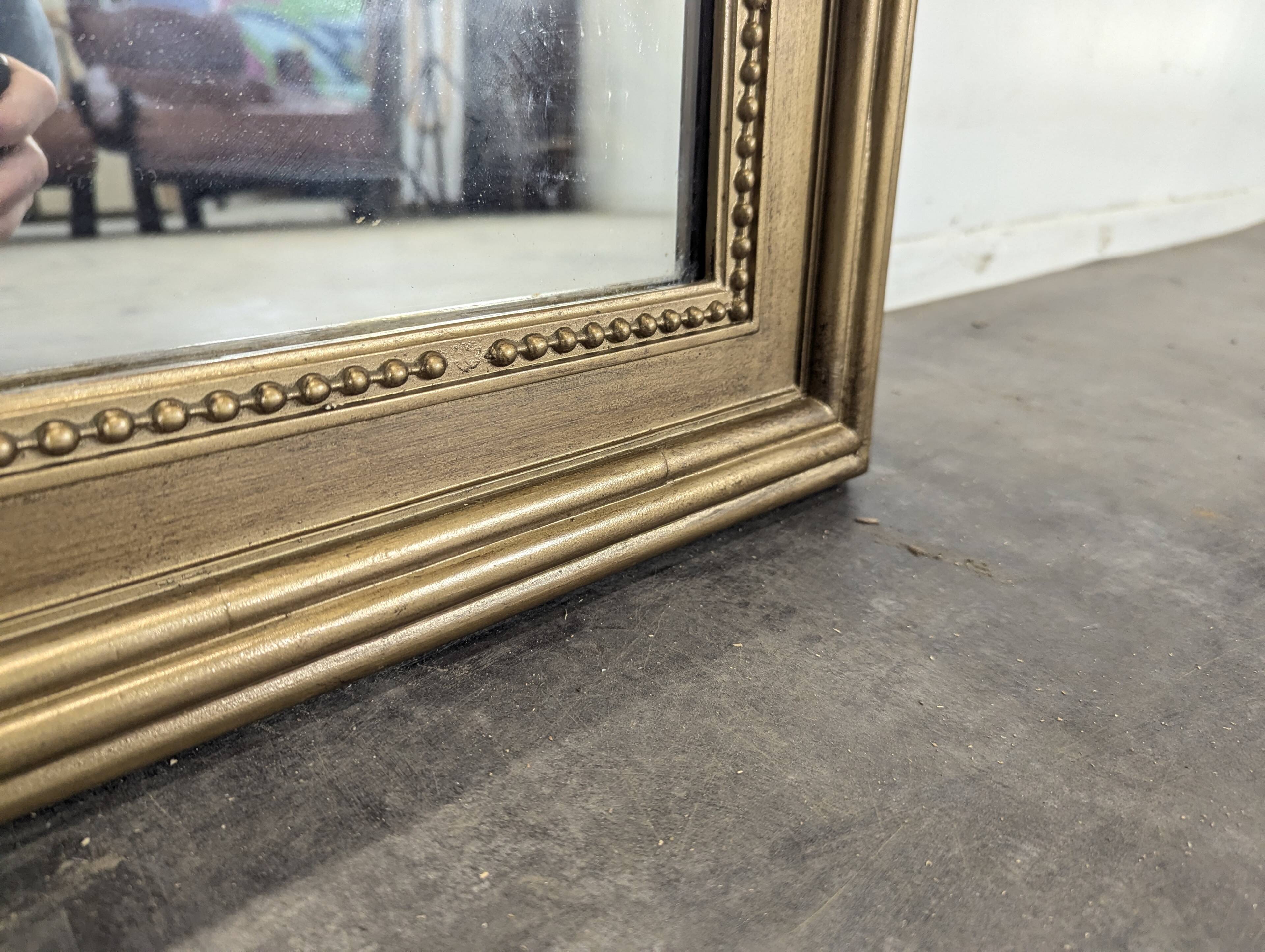 Louis XVI style mirror from the late 19th century.