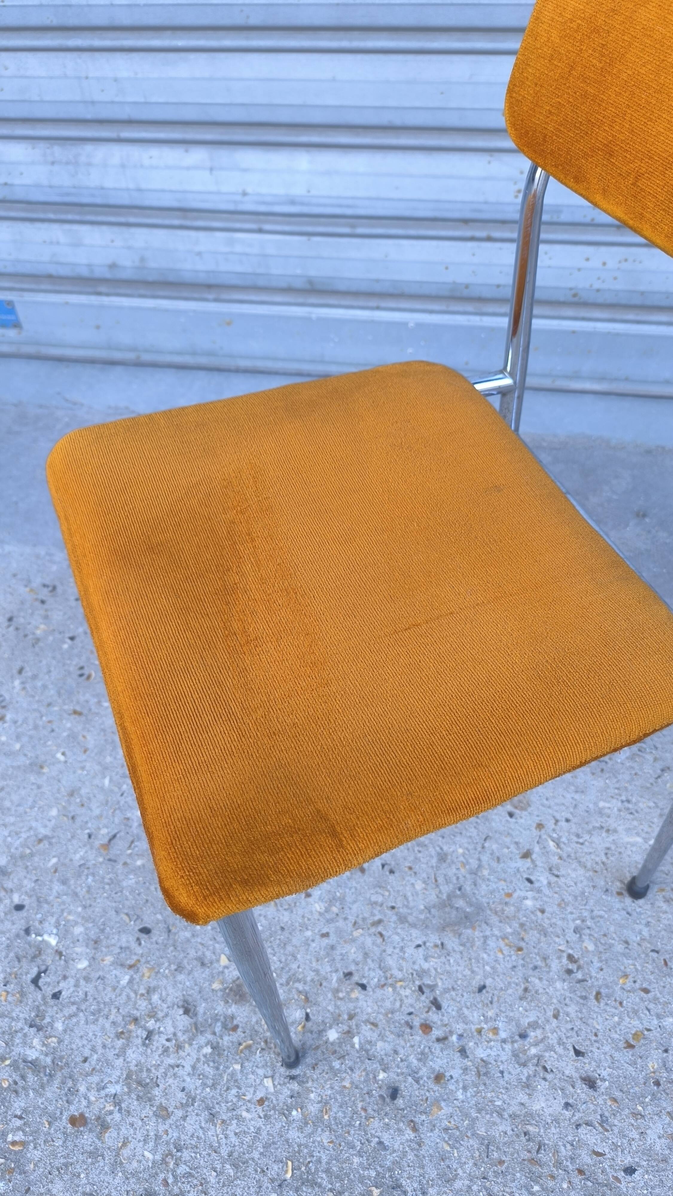 Chrome tubular chair with orange velvet, 1970s