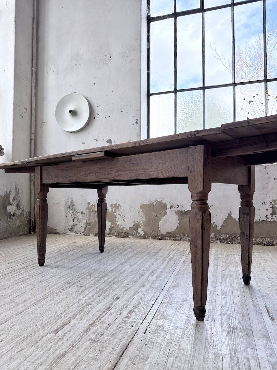 Solid oak farmhouse table with integrated extensions 1950