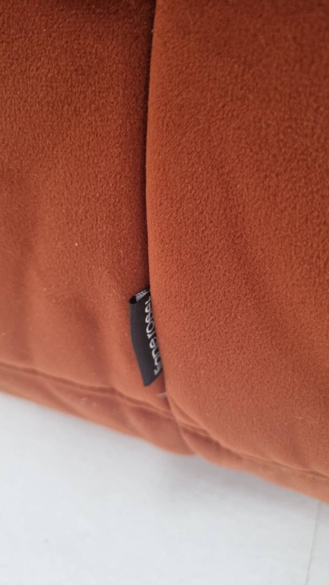 Ligne Roset Pair of 3-seater Togo sofas in rust velvet