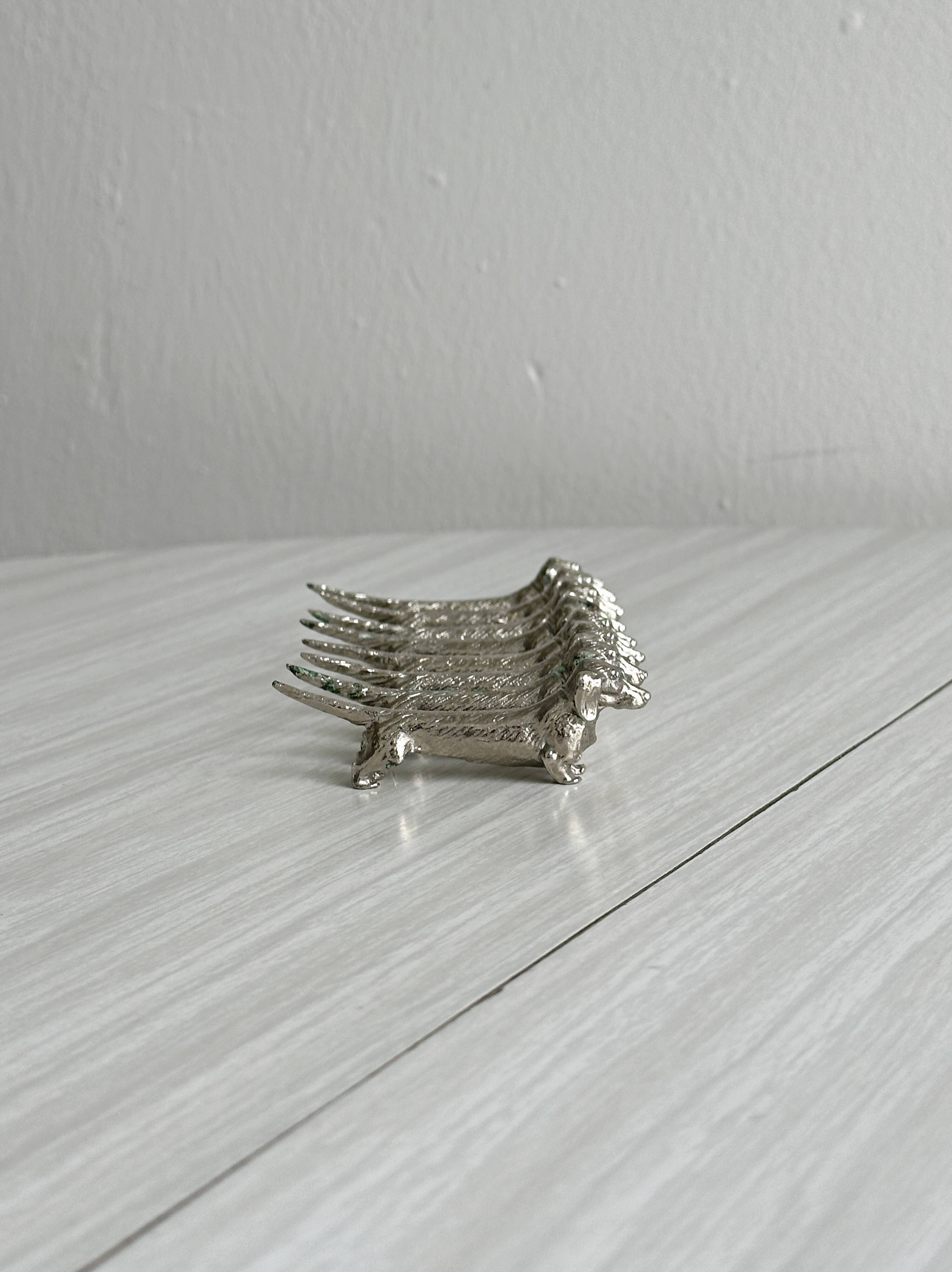 Set of 8 dachshund-shaped knife rests