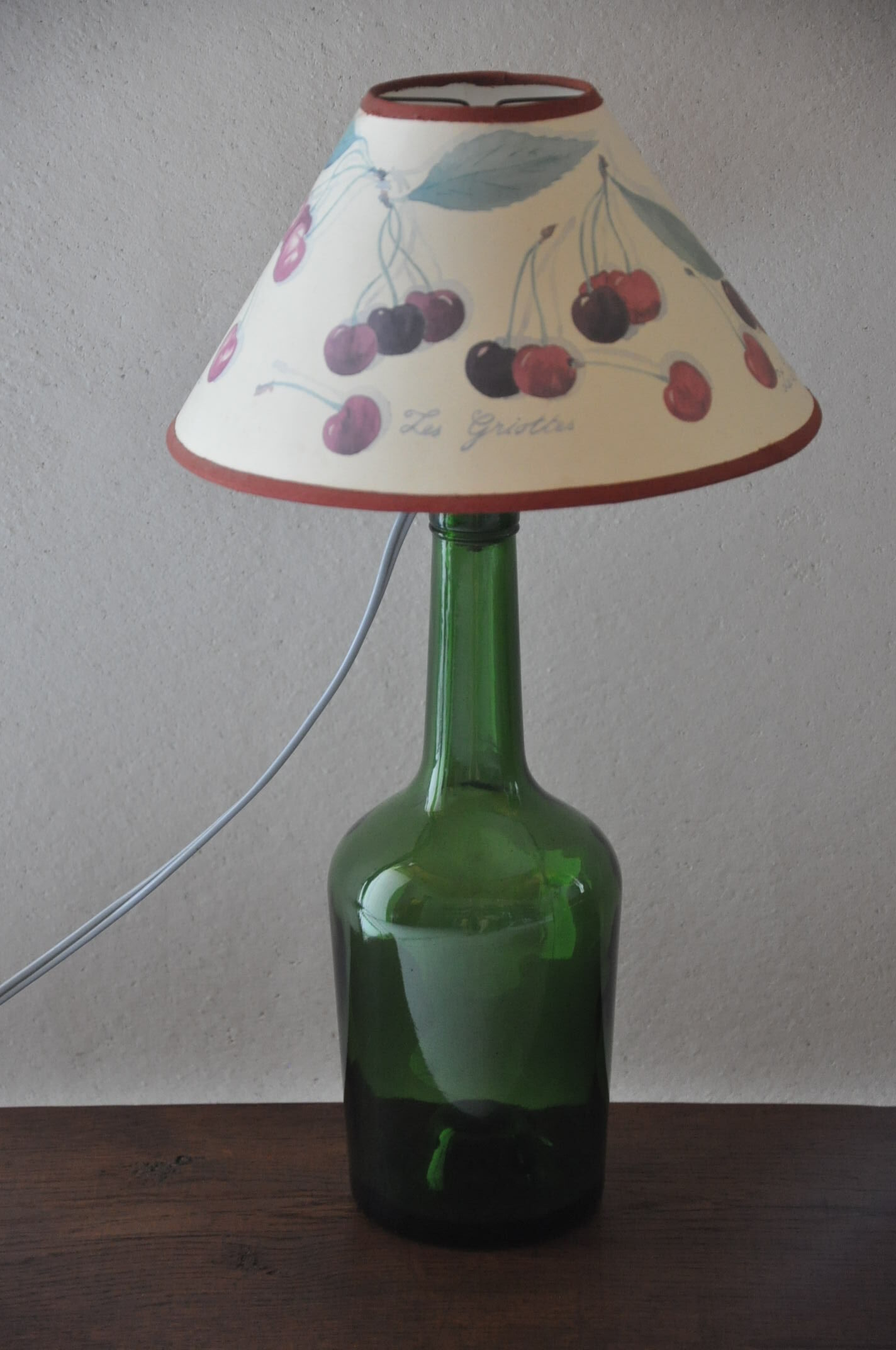 Lampe bouteille en verre vert