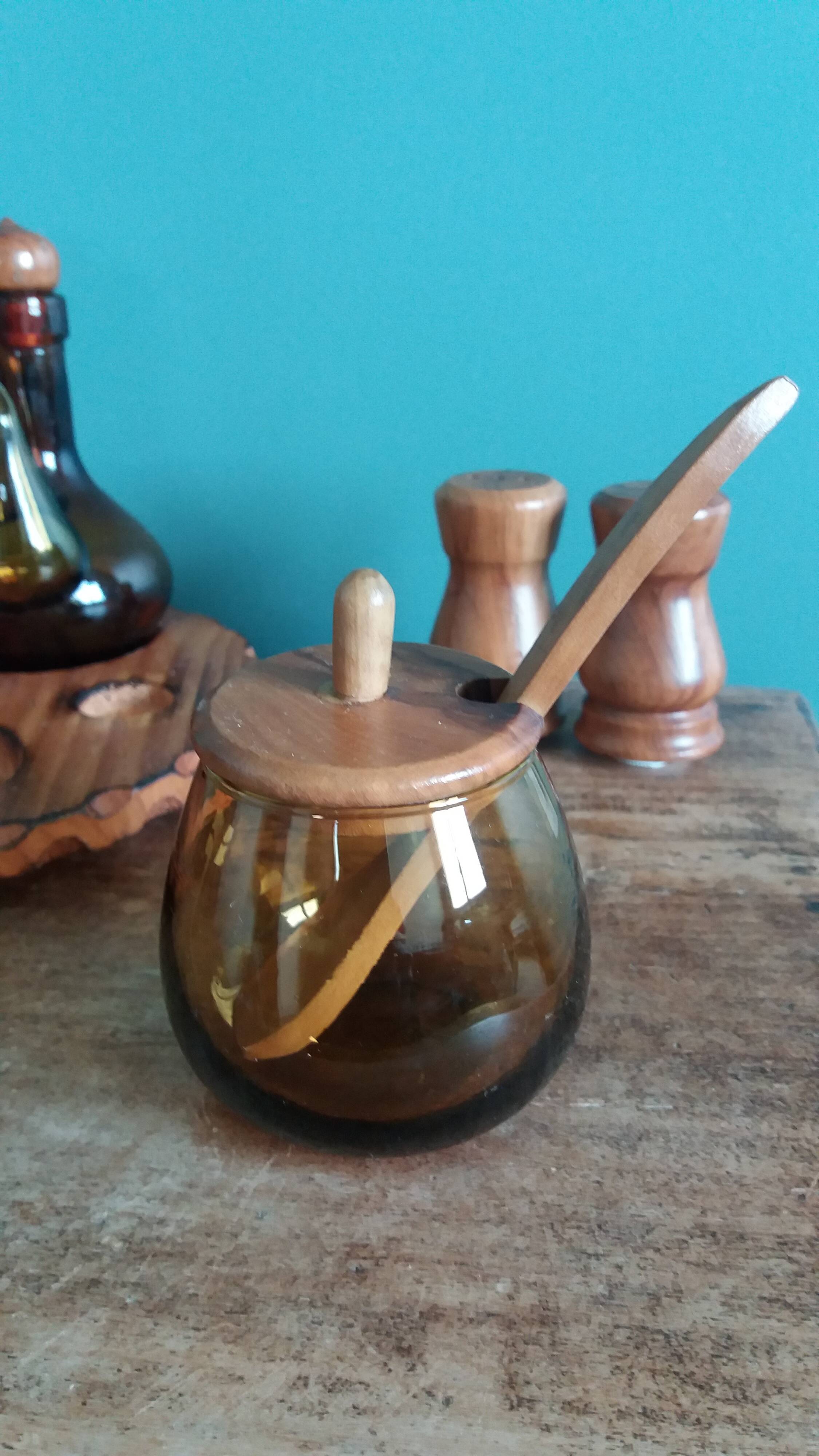 Oil, vinegar, mustard, pepper, salt, olive wood servant from Spain.