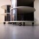 Pair of mirrored space age cylindrical bedside tables, 1960