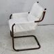 Tubular armchair, fabric suspended seat. Circa 1970