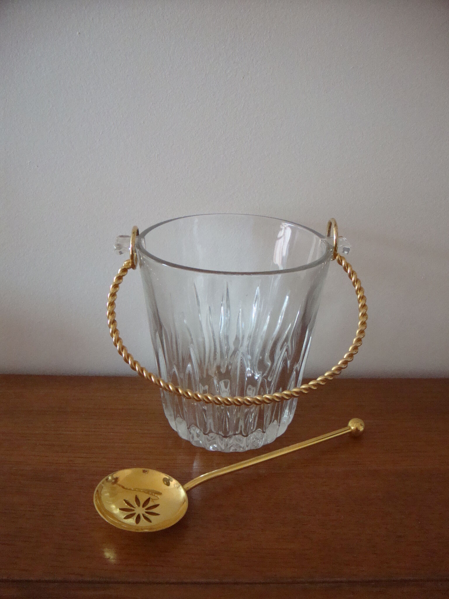 Glass ice bucket and metal dore