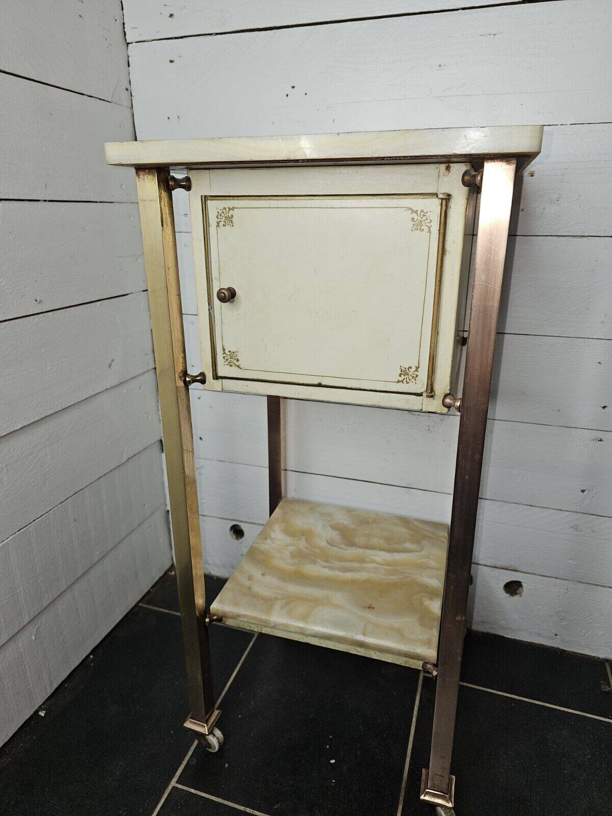Bedside table in patinated iron, brass and marble tops