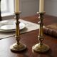 Paire de bougeoirs anciens en laiton
