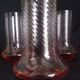 Art Deco orangeade service in pink-orange glass, twisted model.