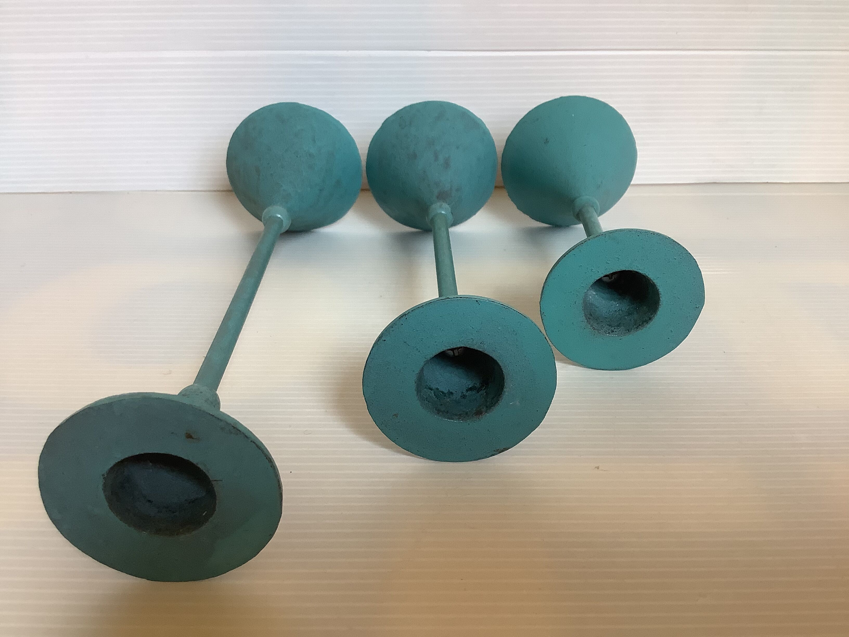 Trio of candlesticks patinated blue green vintage