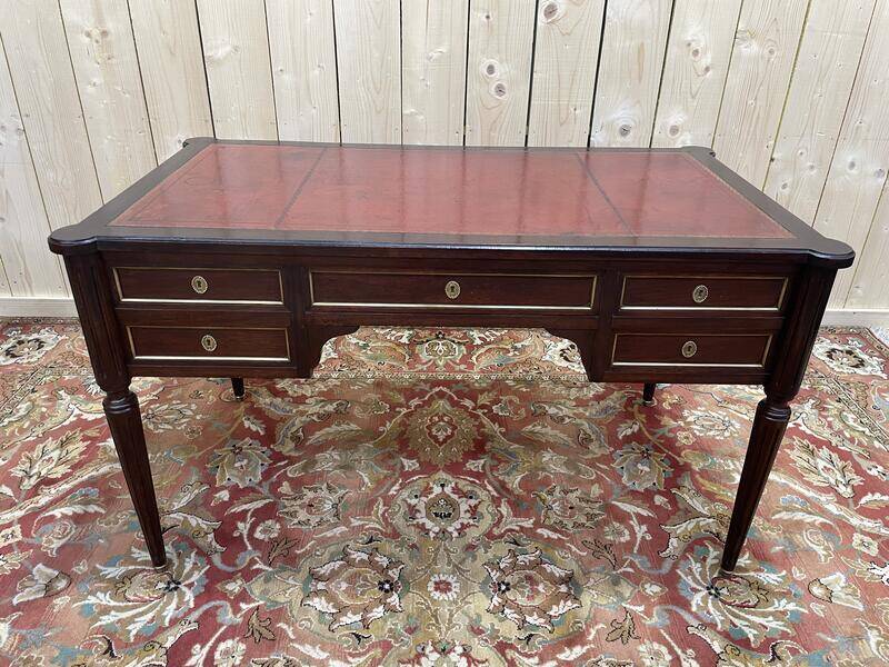 Bureau plat de style Louis XVI acajou et cuir rouge