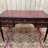 Bureau plat de style Louis XVI acajou et cuir rouge