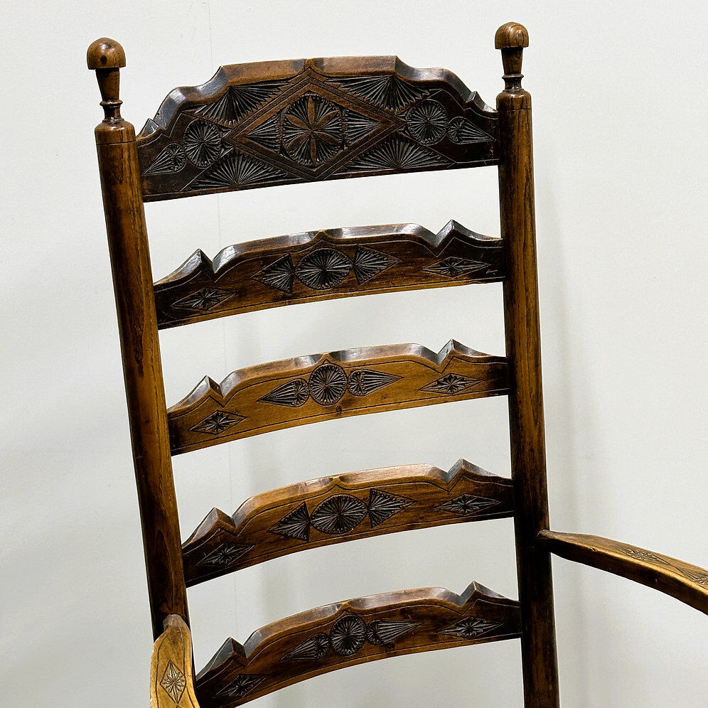 19th century handcrafted and carved ladder back chair, circa 1840s.
