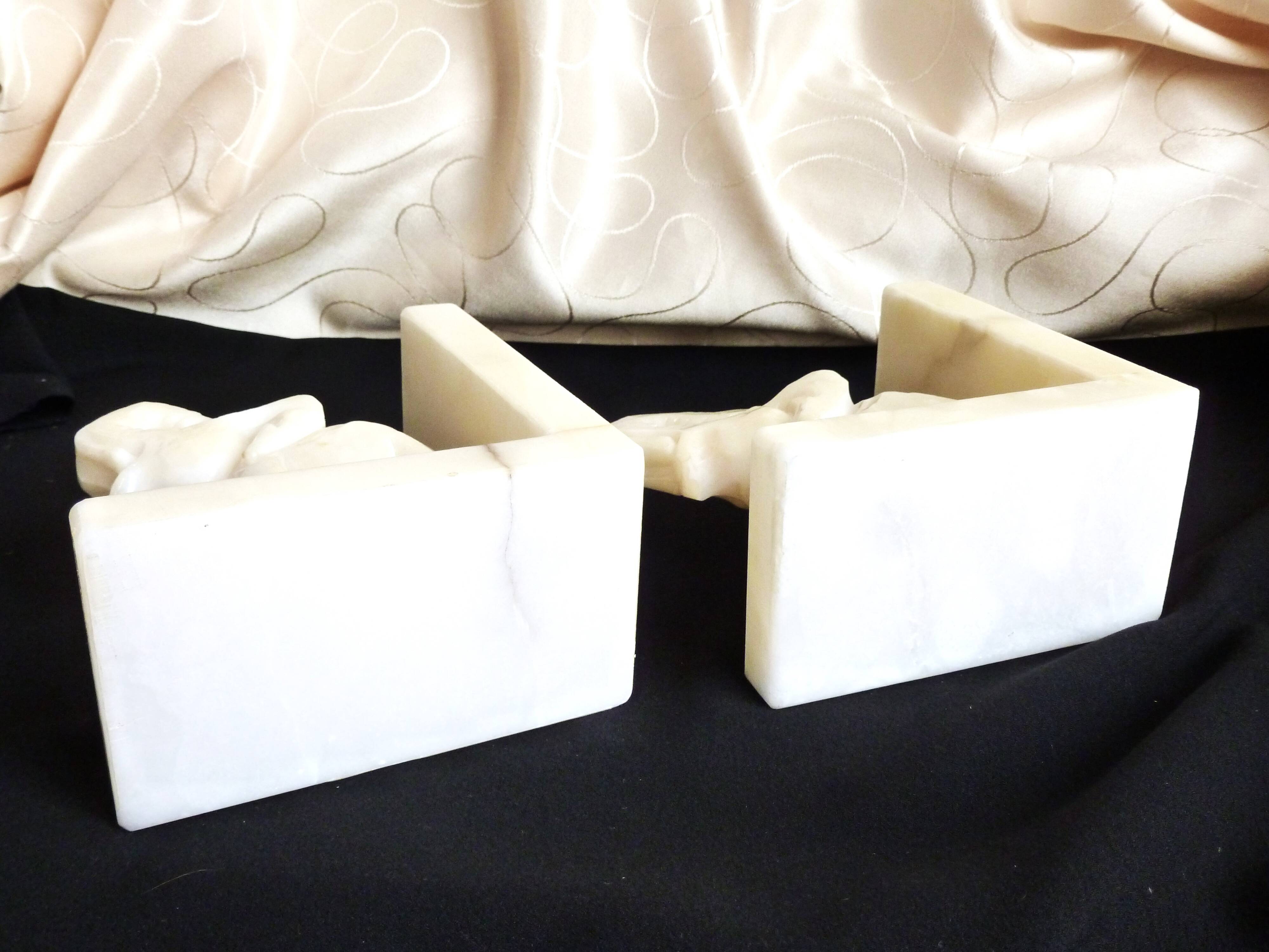 Pair of alabaster elephant bookends, library accessories