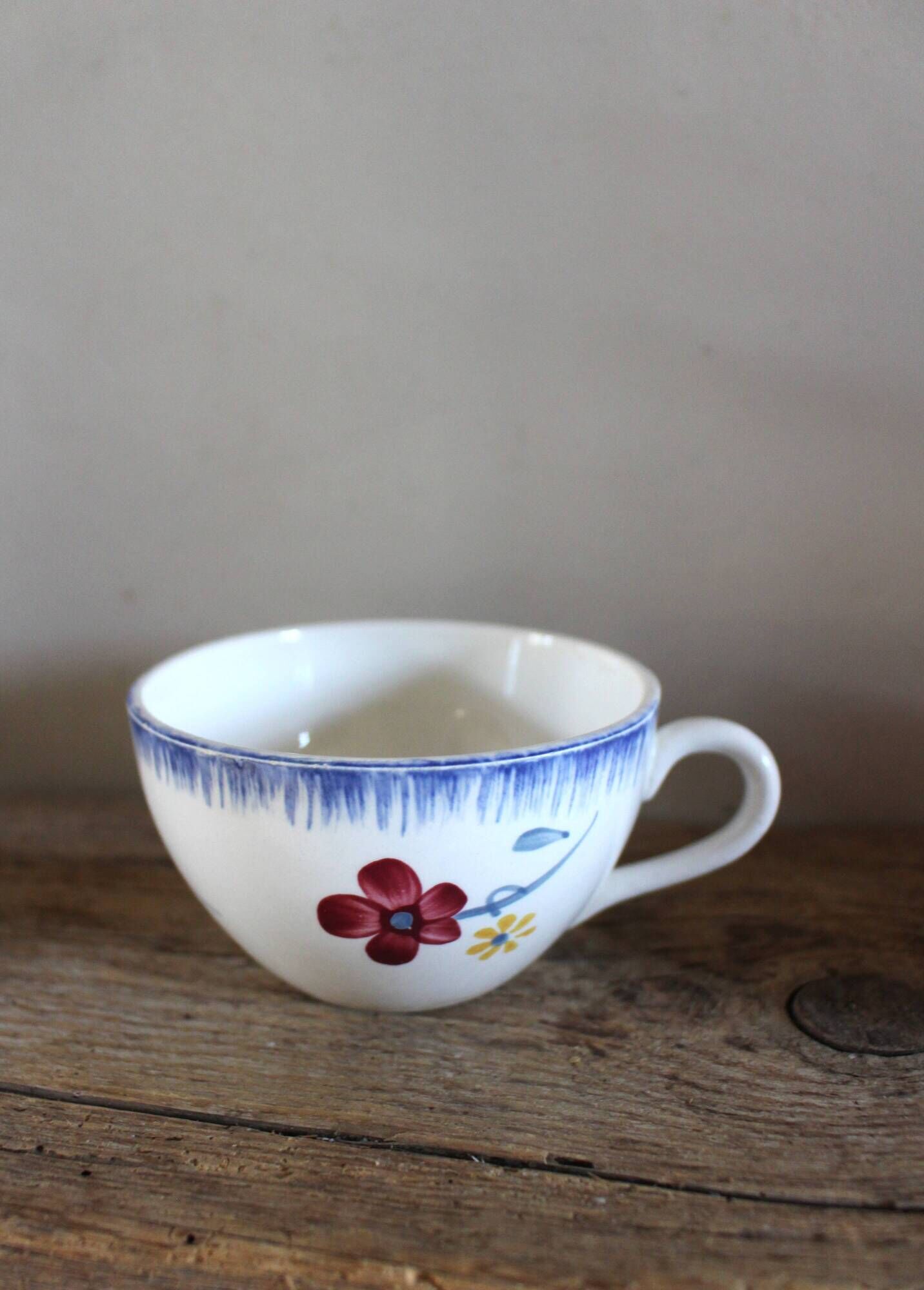 A set of two Digoin Sarreguemines Marylou Rose Art Deco cups.