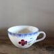 A set of two Digoin Sarreguemines Marylou Rose Art Deco cups.